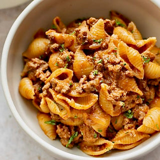 Black Truffle Conchigliette with Pork and Wild Mushroom Sugo