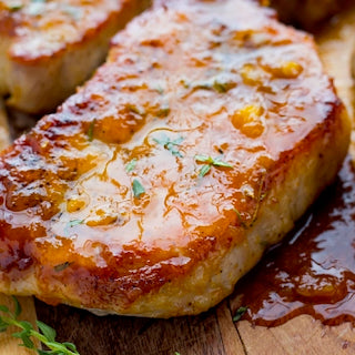 Maple Glazed Pork Chops with Thyme-Poached Quince