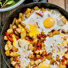 Potato, Onion, Roasted Red Pepper Hash with Baked Eggs