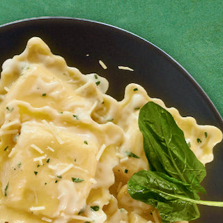 Goat Cheese Ravioli with Caramelized Shallots & Mushroom-Sage Cream Sauce