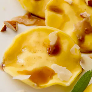 Roasted Butternut Squash Ravioli with Balsamic Shallot Sauce
